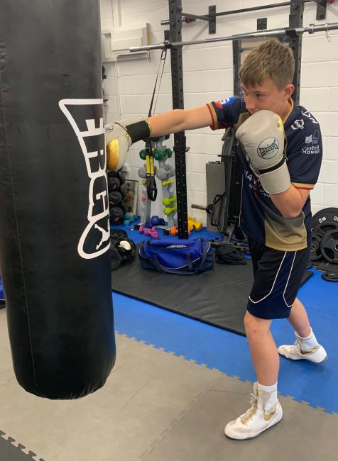 Morgan grafting away on the heavy bag